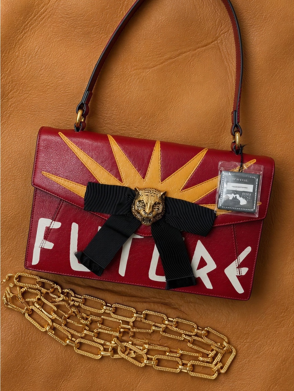 Gucci Red Leather Shoulder Bag with Yellow Sunburst and Black Bow